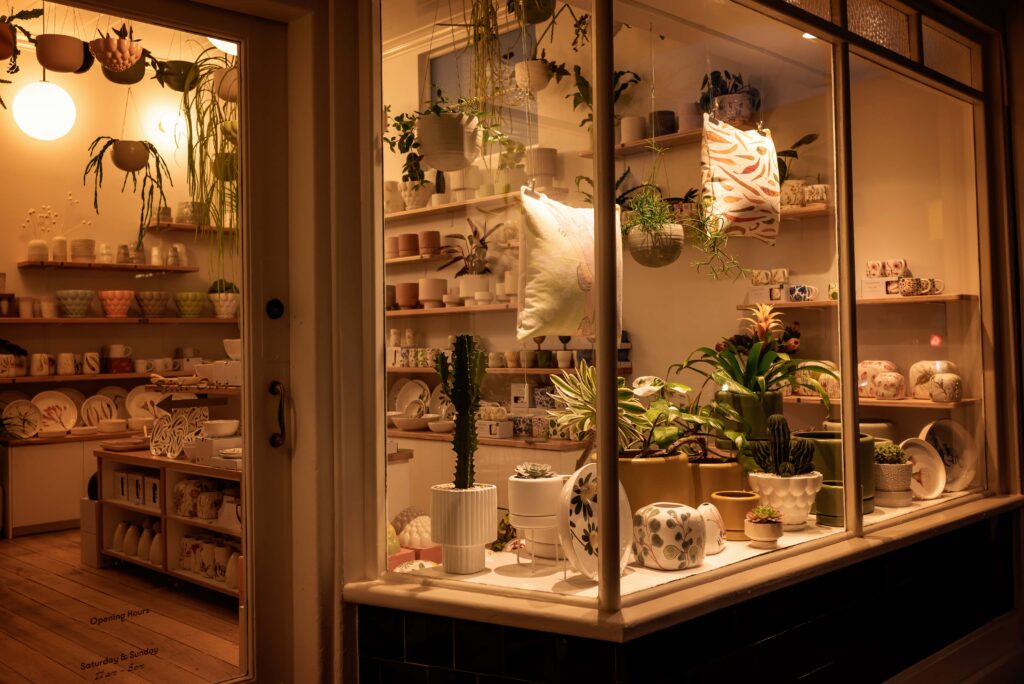 Shop window of Angus & Celeste Ceramics in Olinda after dark