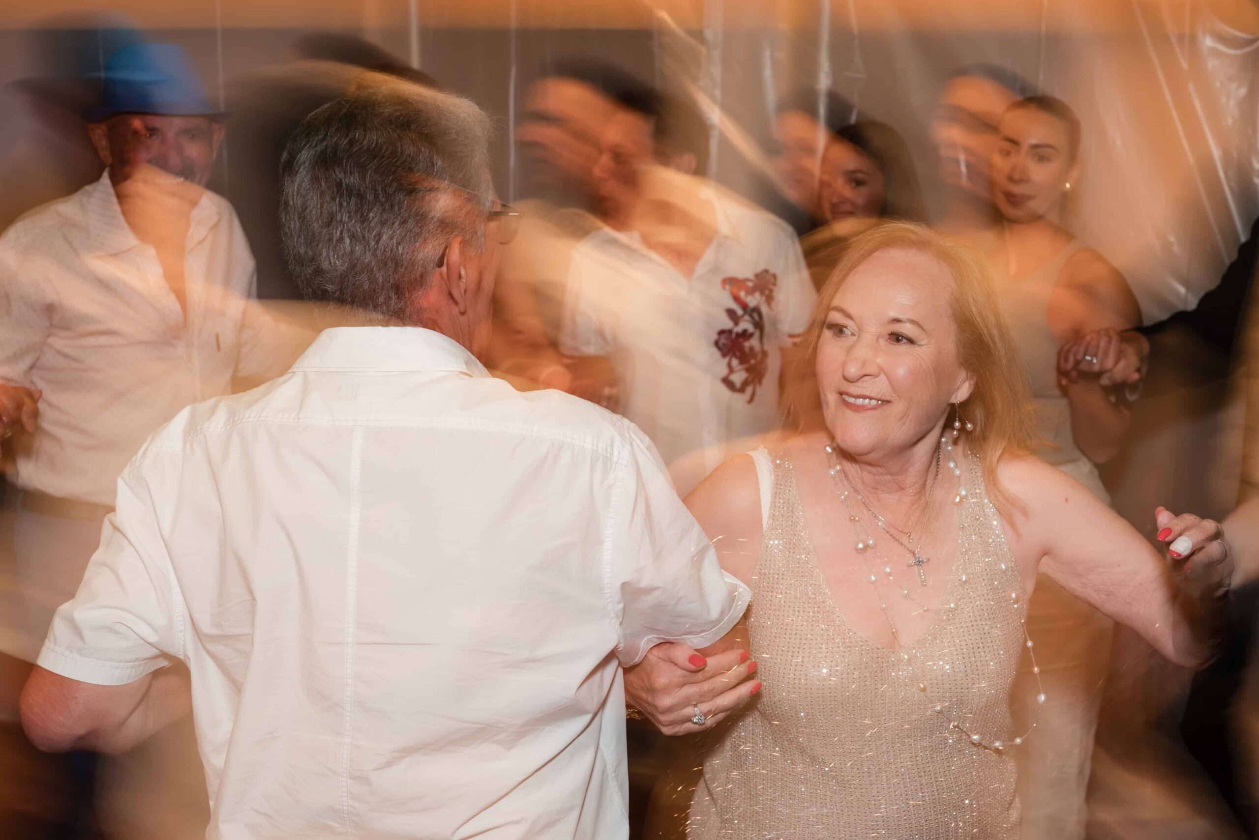 Couple dancing at 80th birthday party