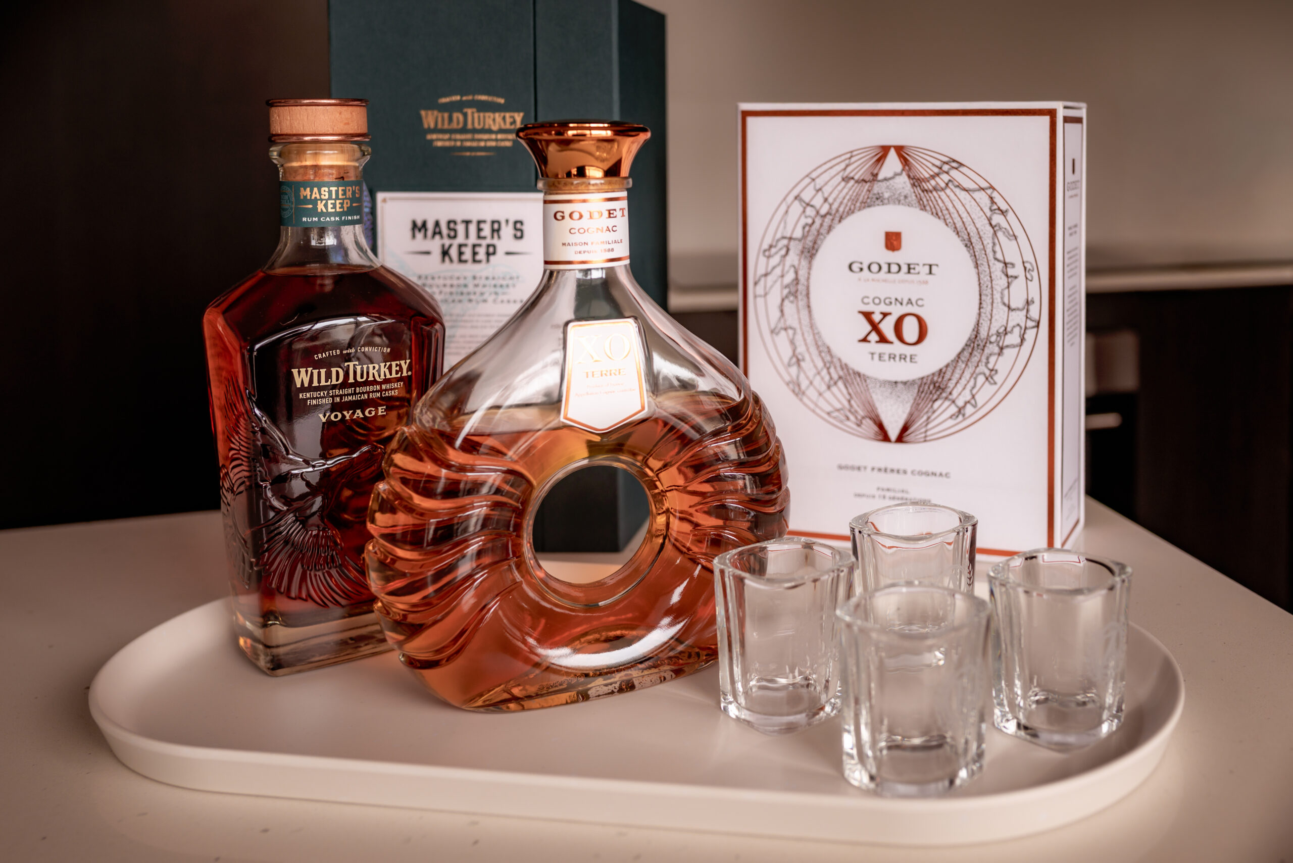 Groom's drinks and shot glasses